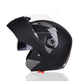 Black motorcycle helmet with clear visor on a white background