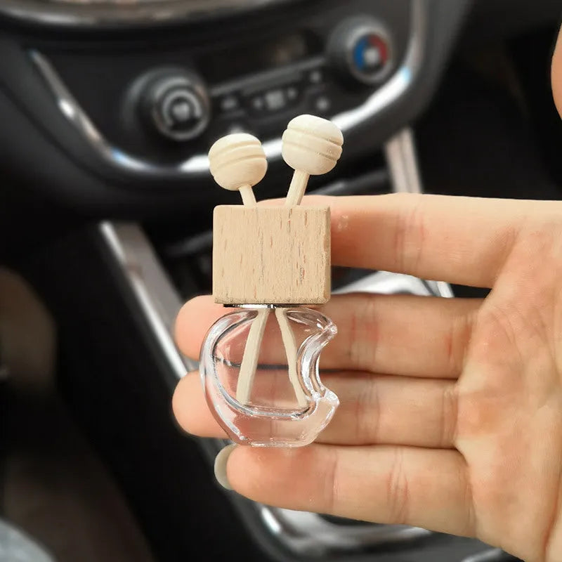 مقطع زجاجة عطر السيارة