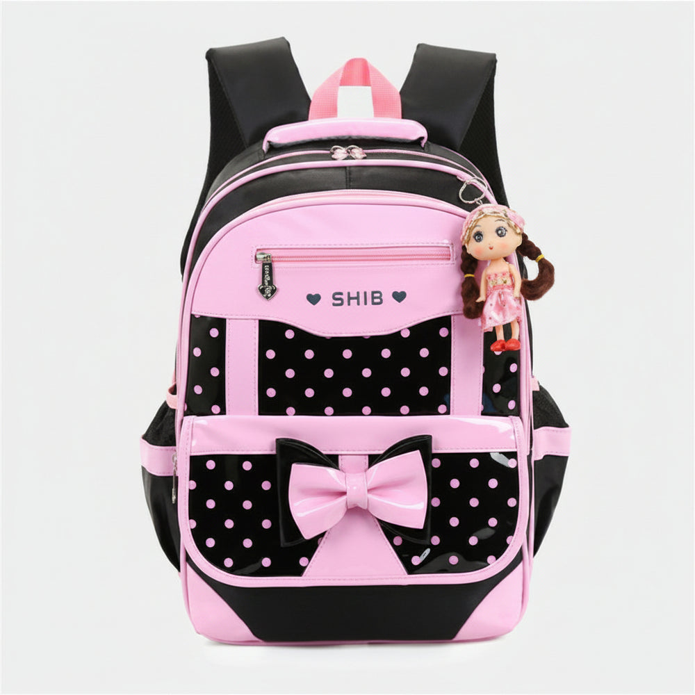 Pink and black backpack with a bow and polka dot pattern on a white background