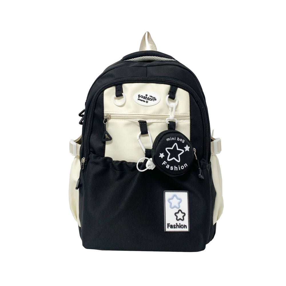 Black and white backpack with decorative elements on a white background