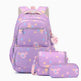 A pastel purple backpack set with matching pouches, featuring a cute cartoon space and animal print. The set includes a large backpack, a small shoulder bag, and a pencil case, all with matching pink straps and a heart-shaped 'Double A Girl' tag.