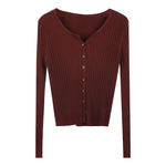 Brown ribbed sweater with buttons on a white background