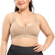 Woman wearing a beige compression garment on a white background