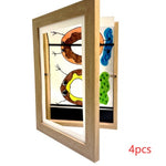 Wooden picture frame with colorful cutout letters inside on a white background