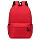 Red backpack with black straps on a white background