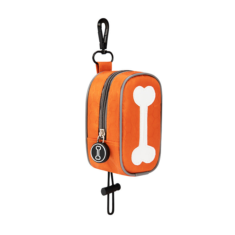 Orange pet waste bag dispenser with a bone design on a white background
