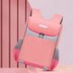 Pink backpack with gray accents on a pink background