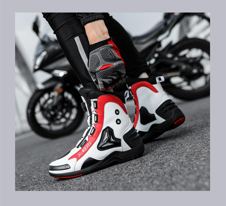 Motorcycle boots with red and black accents on a blurred motorcycle background
