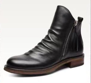 Black leather boot with a zipper on a white background
