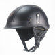 Black leather helmet with chin strap on a white background