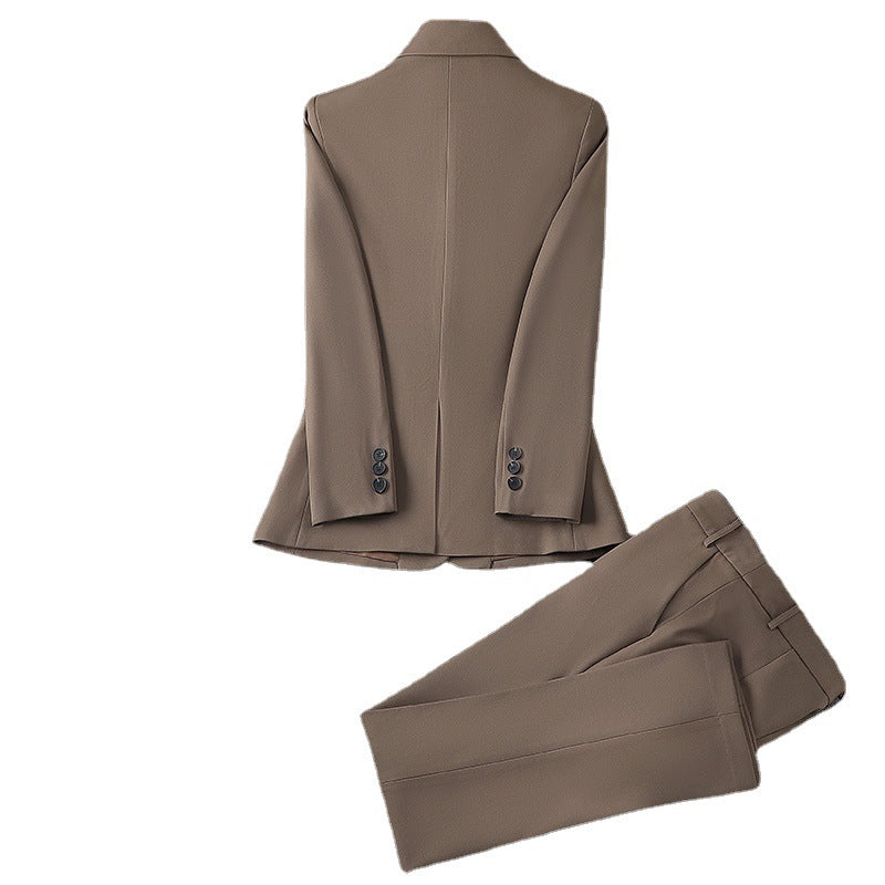 Brown suit jacket and pants on a white background