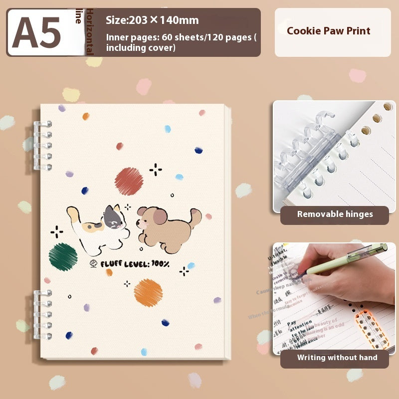 Notebook with cookie paw print design on a beige background