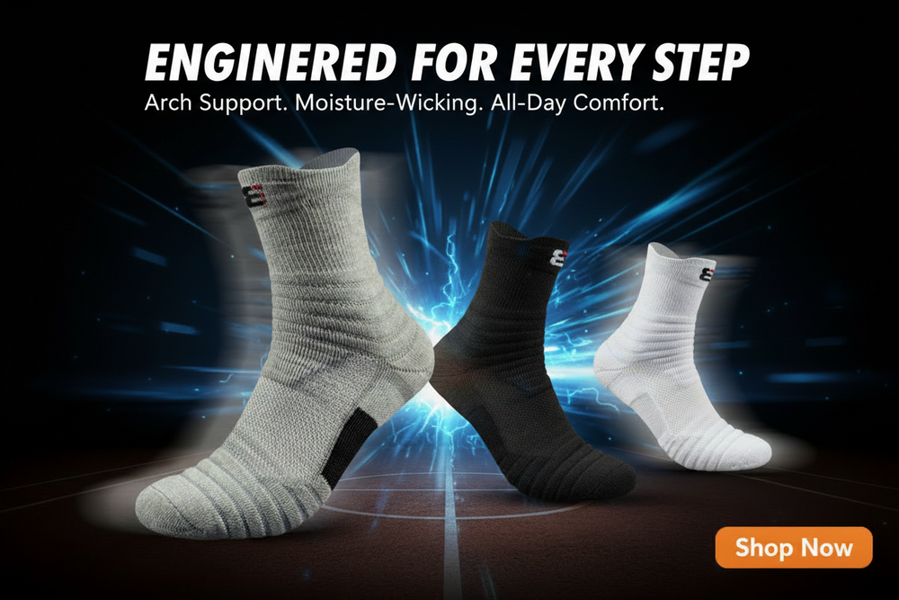 Three athletic crew socks in white, black, and gray are shown floating against a dark background with orange light effects and the text 'PERFORMANCE ENGINEERED' and a 'Shop Now' button.