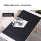 Black desk mat on a white desk with a plant and stationery items, labeled 'Single-sided style Classic Black'.