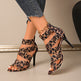 Sandales à talons aiguilles pour femmes avec lanières croisées et imprimé léopard - Talons hauts ouverts pour fêtes et tenues de soirée 