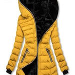 Yellow puffer jacket with black hood on a white background