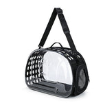 Black pet carrier with clear front on a white background