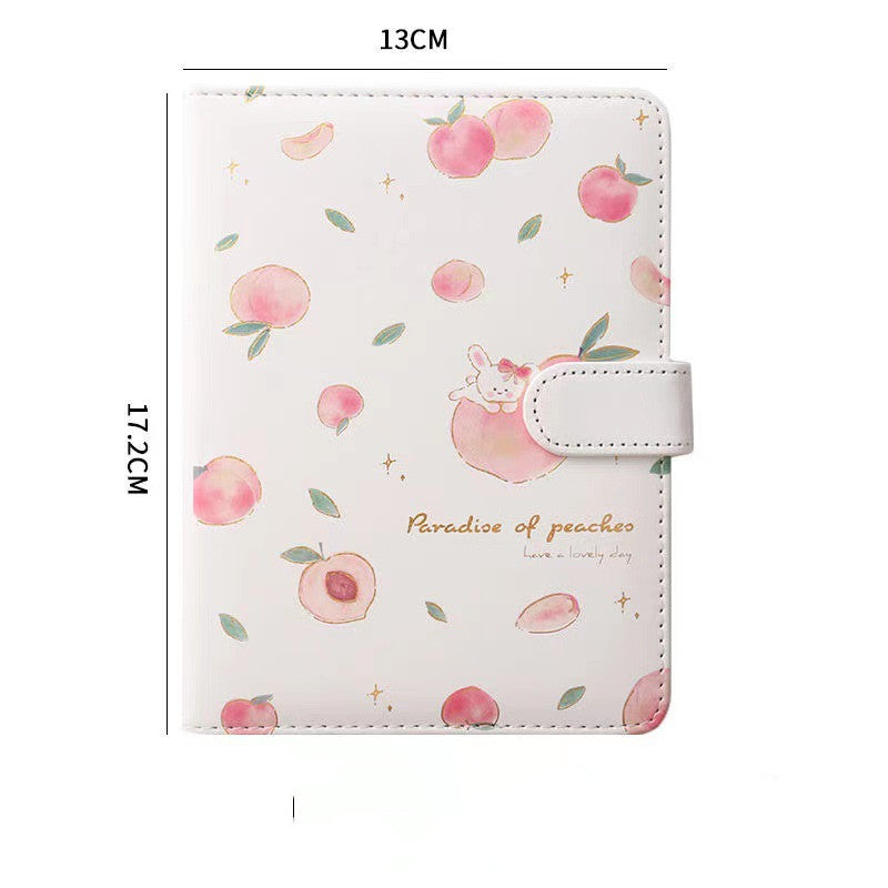 Notebook with peach pattern and measurements on a white background