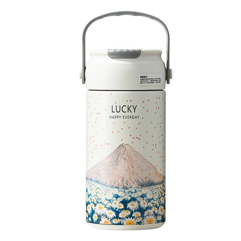 Thermos with mountain and floral design on a white background