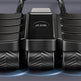 A black multi-functional massage and exercise device with three main massage pads on top and three textured cylindrical rollers underneath, shown on a dark gray background with blue light effects.