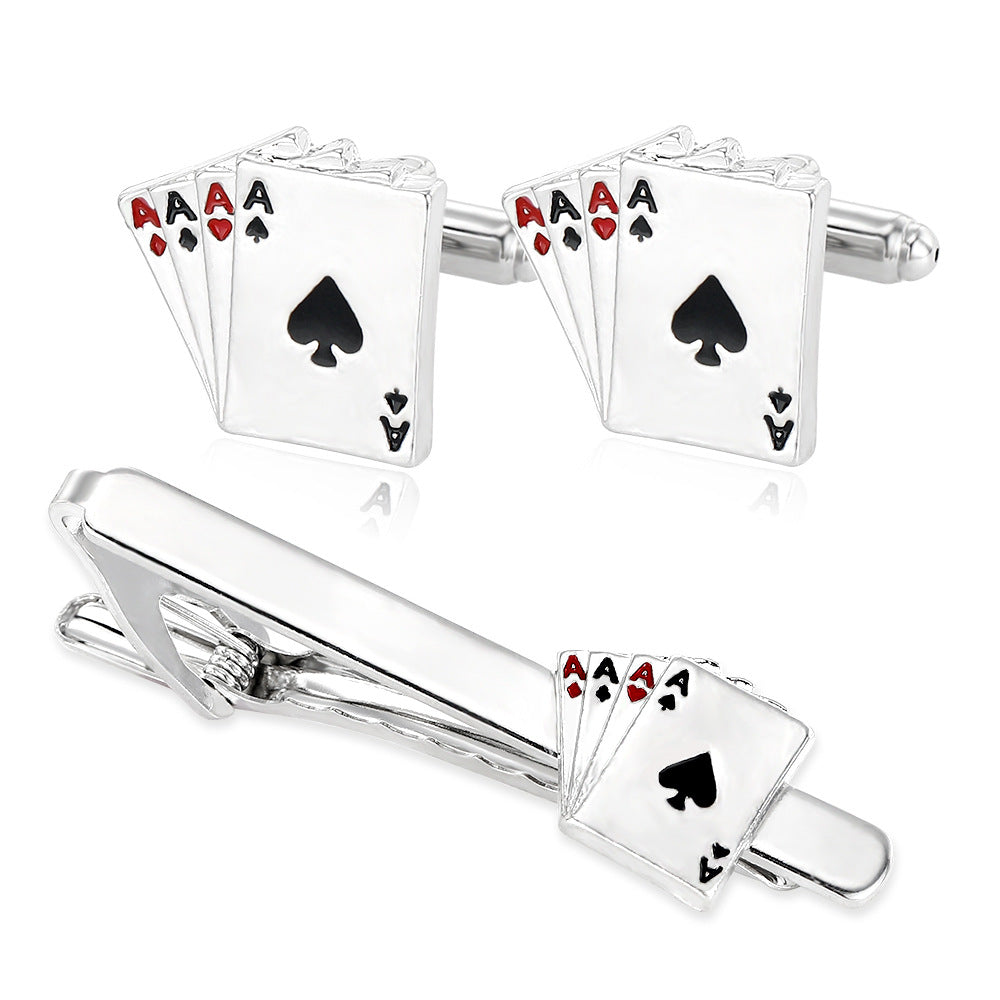 Cufflinks and tie clip set with playing card design on a white background