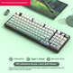 Mechanical keyboard with RGB lighting on a light green surface, featuring text about connectivity options and features.