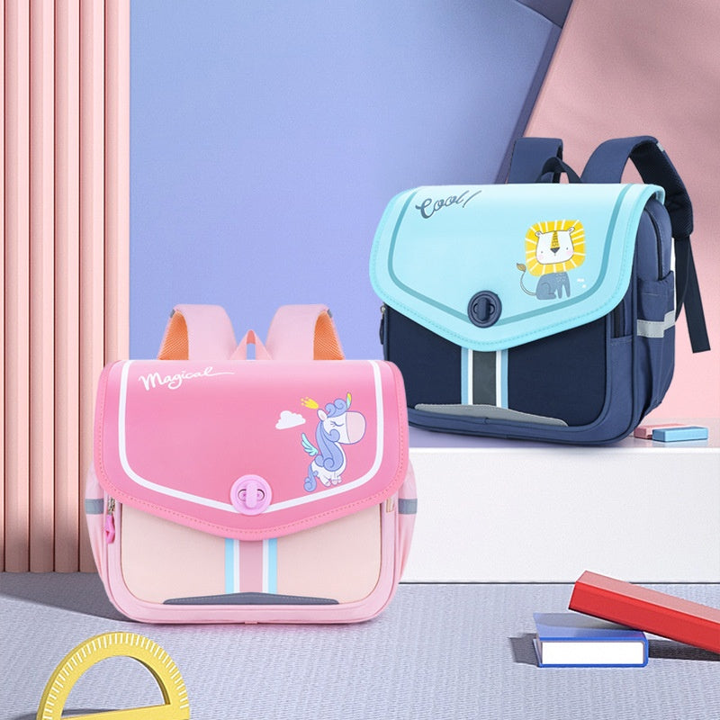 Two children's backpacks, one pink and one blue with a lion design, on a light blue background.