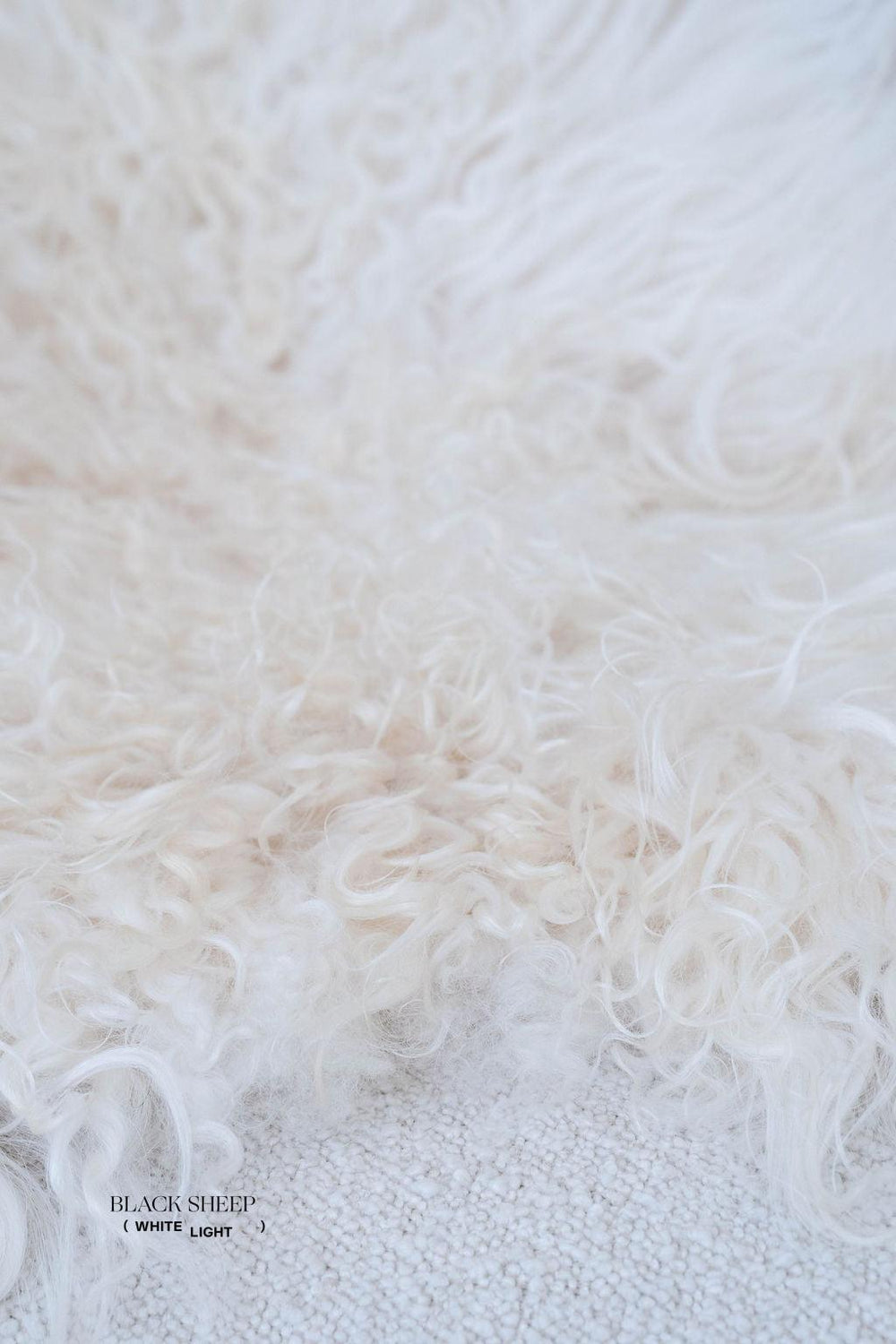 Peau de mouton islandaise bouclée blanche 