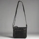 Bolso de cuiro MET V Stitch Crossbody 