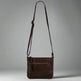Bolso de cuiro MET V Stitch Crossbody 