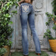 Jeans de mujer con corte acampanado de talle medio y detalles decorativosEX-STOCK Canada 