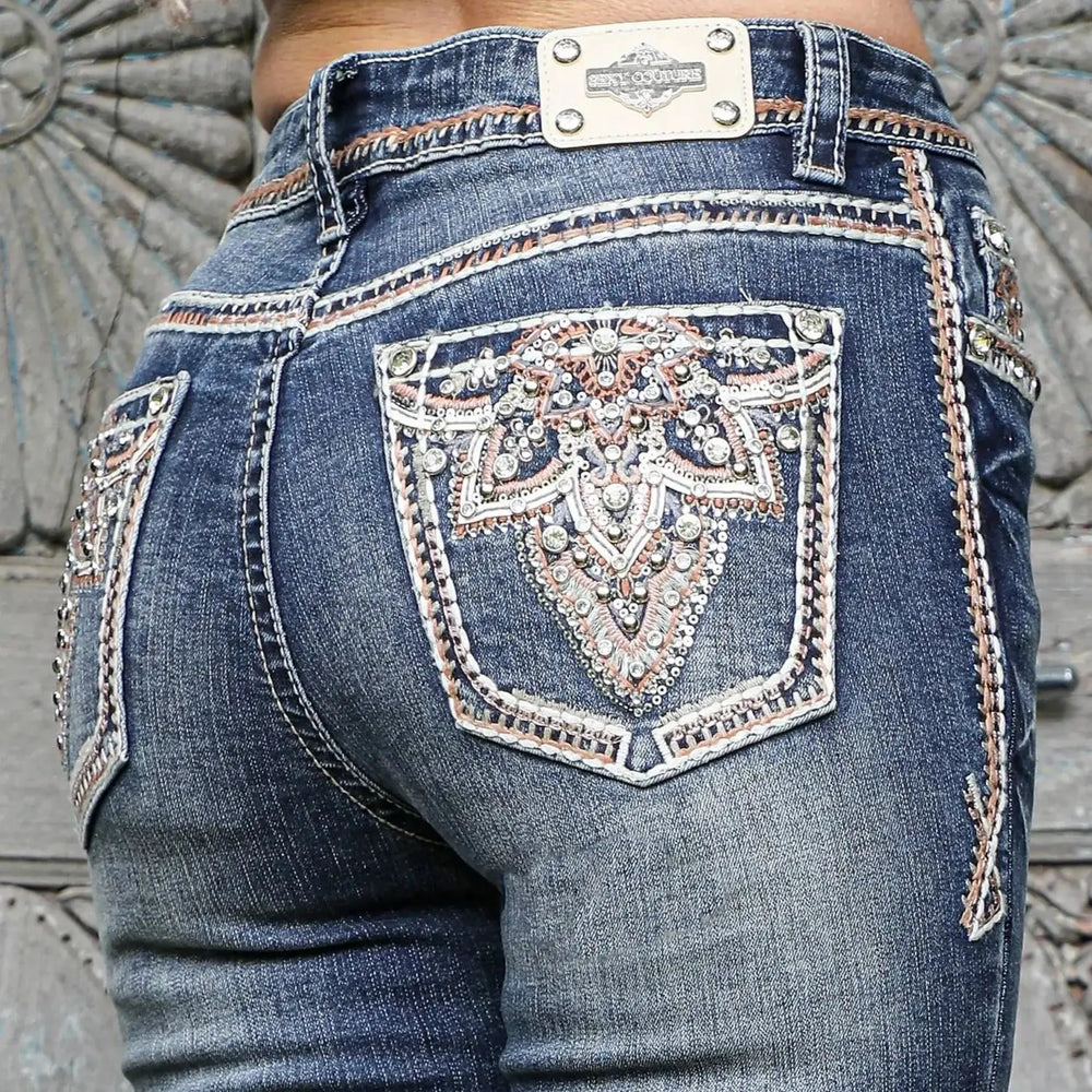 Jeans de mujer con corte acampanado de talle medio y detalles decorativosEX-STOCK Canada 