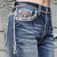 Jeans de mujer con corte acampanado de talle medio y detalles decorativosEX-STOCK Canada 