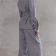 Light gray V-neck blazer-style top and pants set