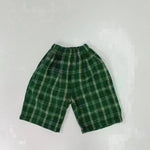 Personalidad de moda para niños pantalones con estilo a cuadros de niños pantalones cortos para niños