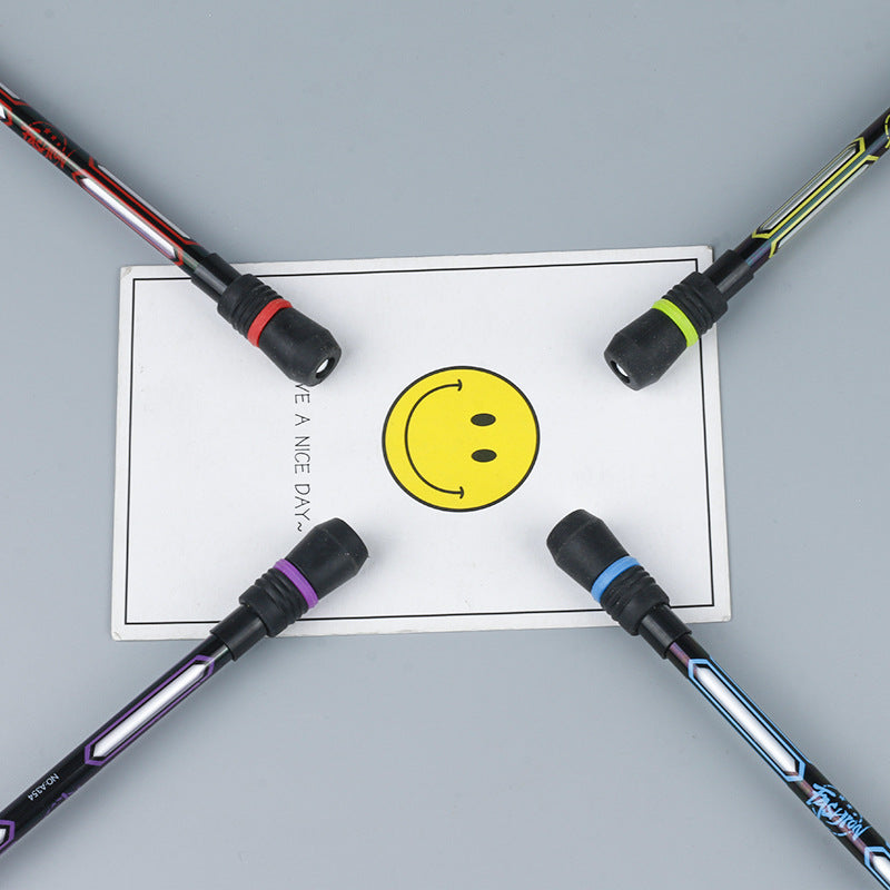 Four fishing rods with colorful handles on a gray surface, with a yellow smiley face card in the center.