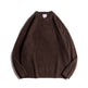 Brown sweater on a white background