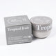Tropical fruit body cream with packaging on a white background