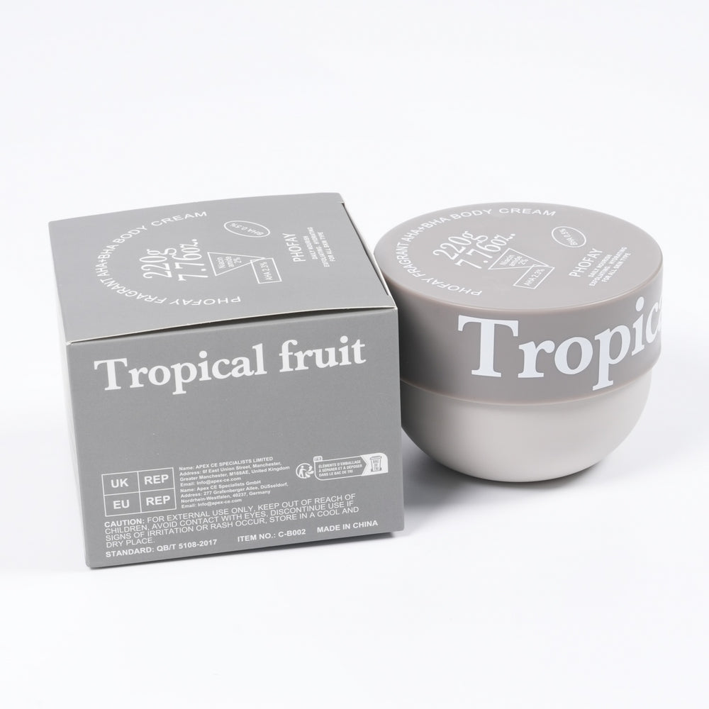 Tropical fruit body cream with packaging on a white background