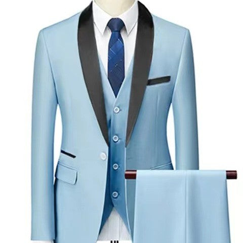 Light blue suit with black lapels and a blue tie on a mannequin against a white background.