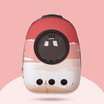 Small electronic device with a beach scene design on a pink background