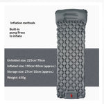 Gray inflatable camping sleeping pad shown on a white background with text detailing inflation methods and size measurements.