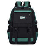 Black and green backpack with 'Fashion' label on a white background