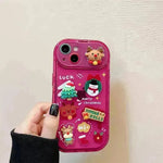 Caso protector de iPhone de silicona con temas de Navidad con chicas colgantes