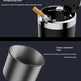 A dark promotional graphic showing a cylindrical cigarette case and matching ashtray with text callouts. The top panel shows the open case with a cigarette resting inside, and the bottom panel shows a brushed metal liner angle view.