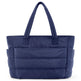 Blue quilted tote bag on a white background