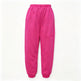 Bright pink jogger-style pants with an elastic waistband and elastic cuffs, shown flat against a plain white background.