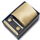 Gold tie set with tie, pocket square, and cufflinks in a black box on a white background