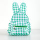 Green and white checkered backpack with bunny ears on a light gray background