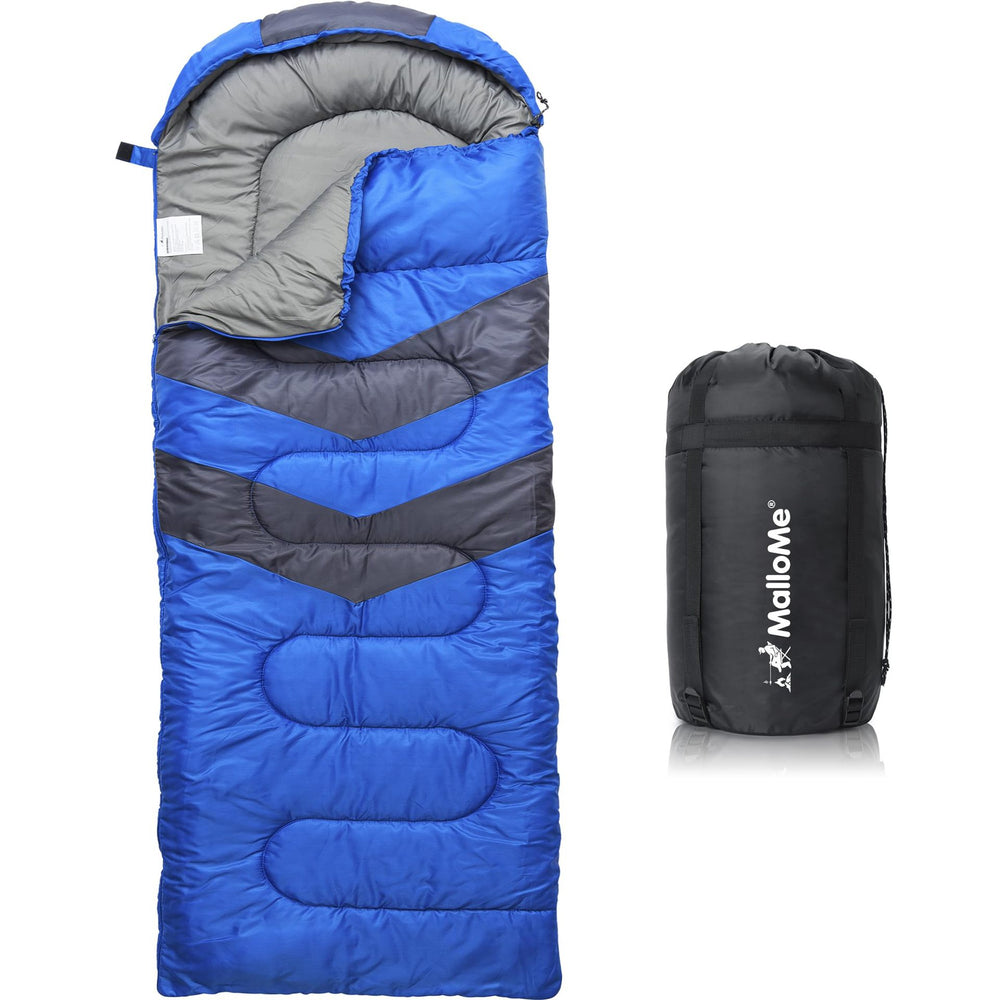 Blue and gray sleeping bag with black carrying bag on a white background